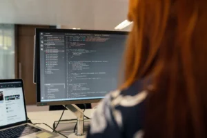 woman looking at computer screen