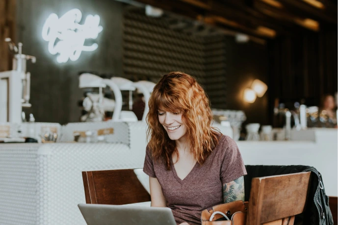 woman looking at computer screen