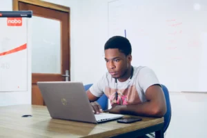 man looking at a computer screen