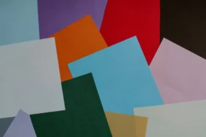 different colors of paper stacked together