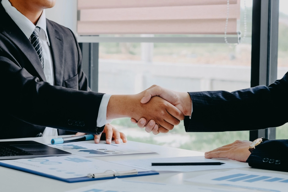 two people shaking hands