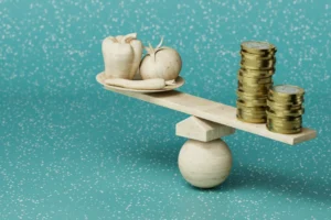 a scale holding gold coins