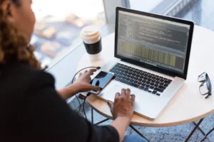 a woman working on a laptop